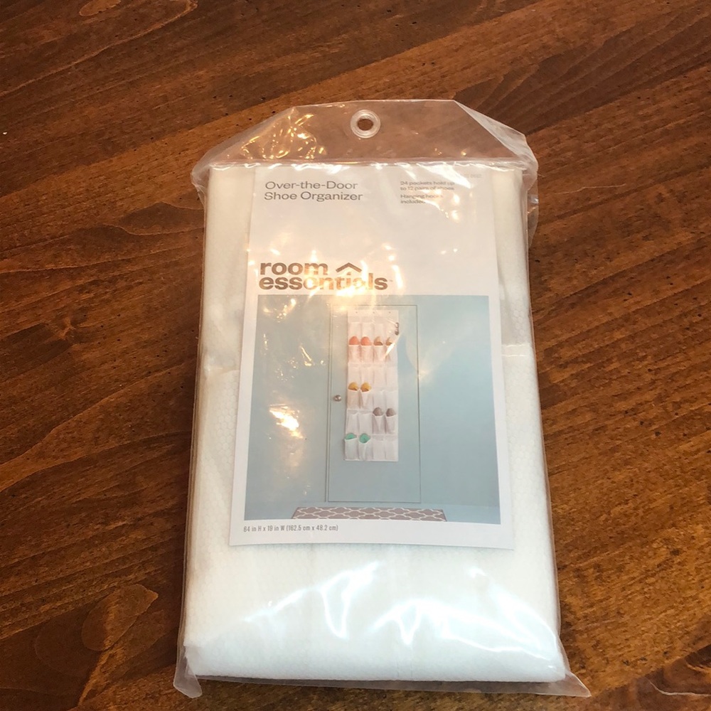 Brand New Over the door shoe organizer. 24 Pockets